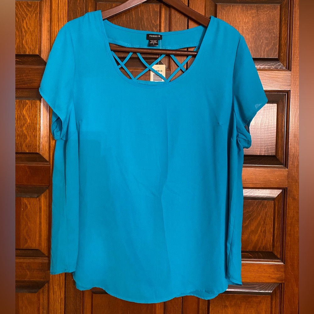 TORRID Blouse with cut out design on back